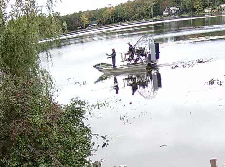 Air Boat applying herbicide to lily pads